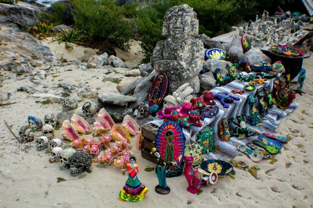 Mexican Souvenirs - a group of toys on a rocky surface