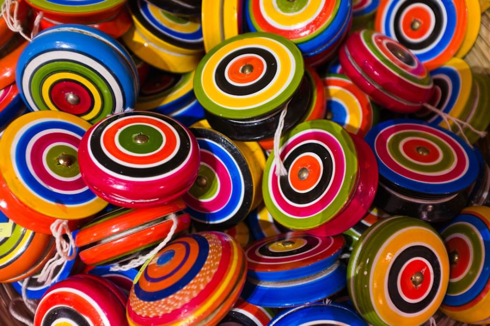 Mexican Souvenirs - a pile of colorful buttons sitting next to each other
