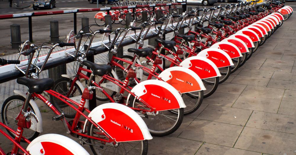 Bike Rental - Parked Red and White Bicycles