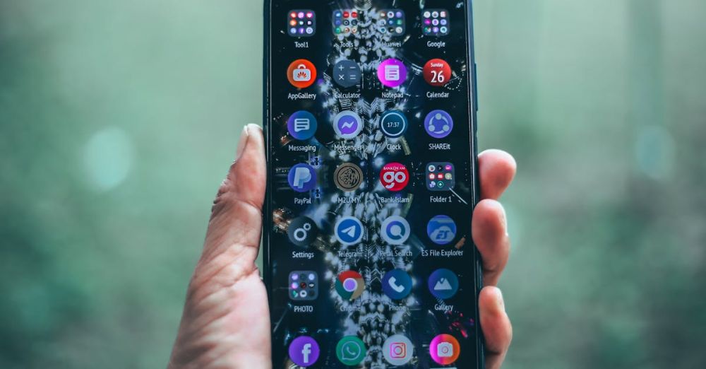 Ride-Sharing Apps - Crop person holding modern mobile phone