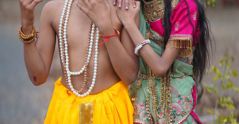 Traditional Jewelry - A man and woman dressed in traditional indian clothing