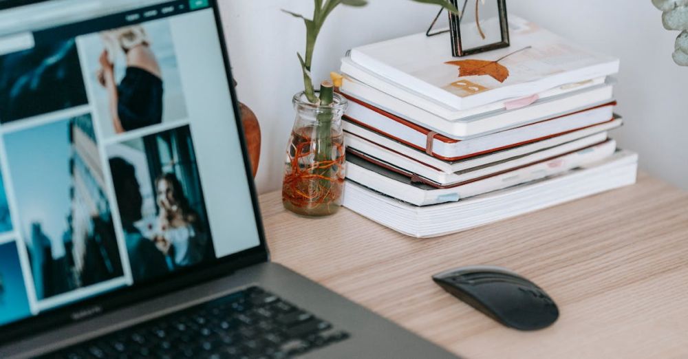 Photography Galleries - Laptop with photo gallery on table in room