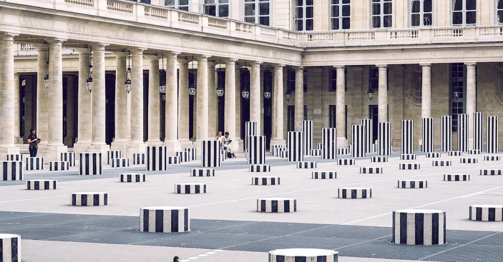 National Palace - Facade of Palais Royal with columns in town