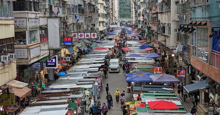 Bargaining - Vendors Stalls in a Street Market in Hong Kong