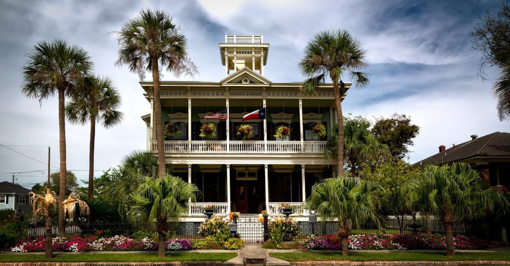 Historic Gardens - White Painted Structure With Green Palm Trees in the Front