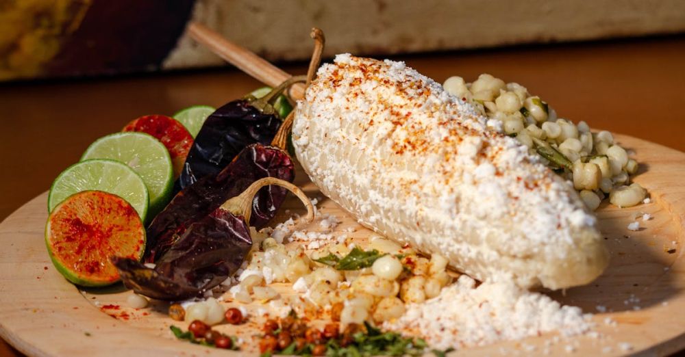 Elote And Esquites - Elote on a Wooden Plate